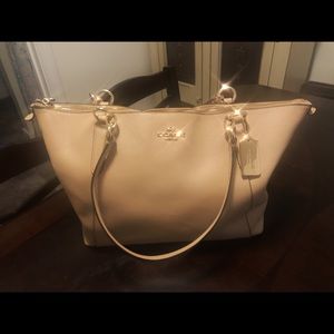 Tan coach purse